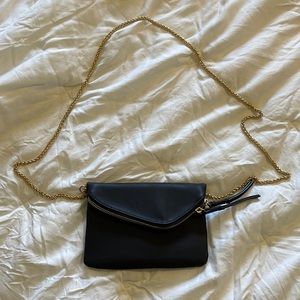 Black purse with gold chain